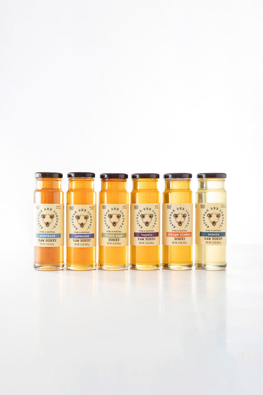Monofloral honey collection on a white background