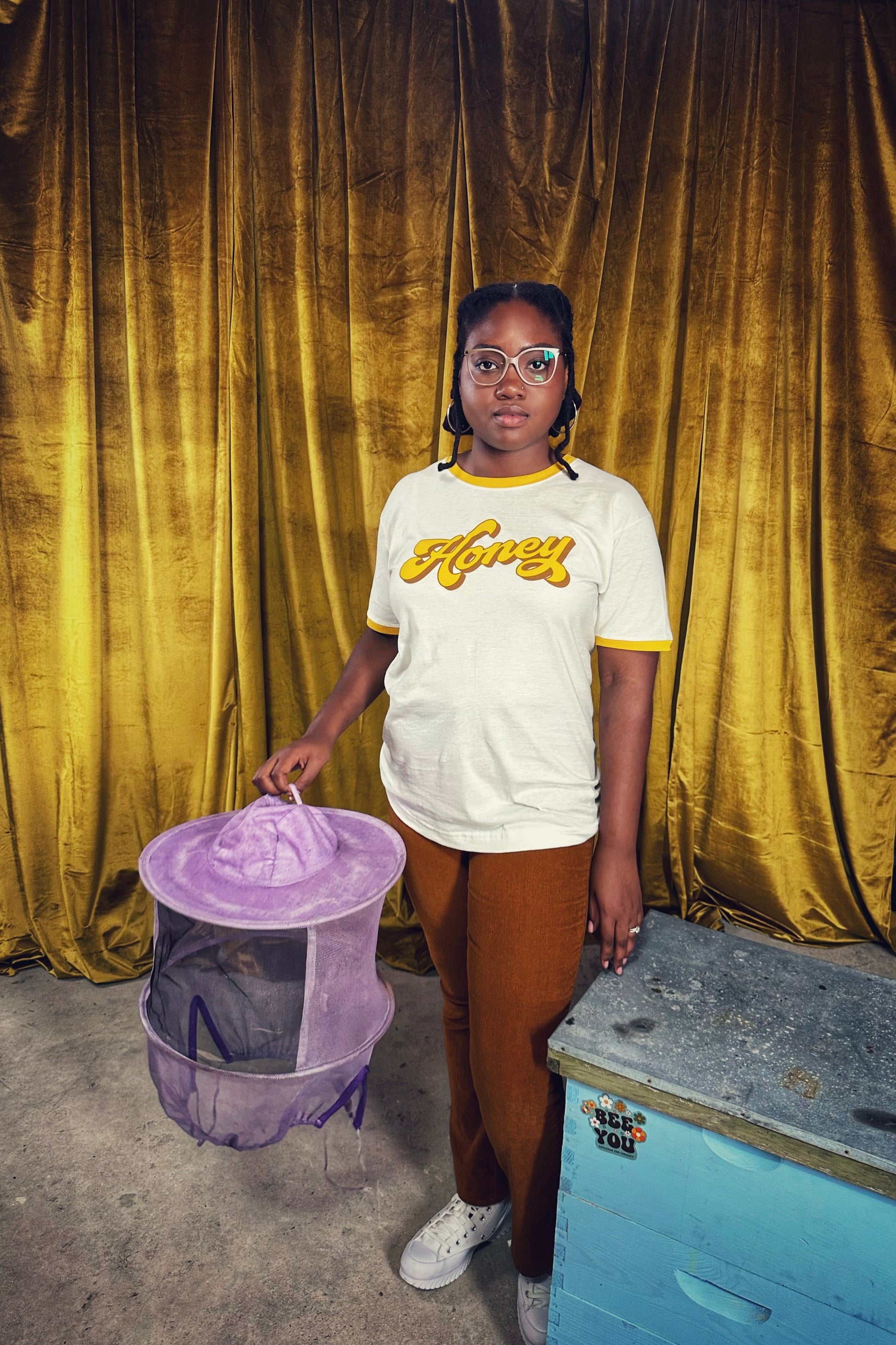 beekeeper-girl-wearing-honey-tee-shirt