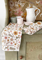 White kitchen towel with floral pattern