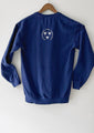 Navy blue varsity sweatshirt from behind with the Savannah Bee Company logo hanging against a white background.