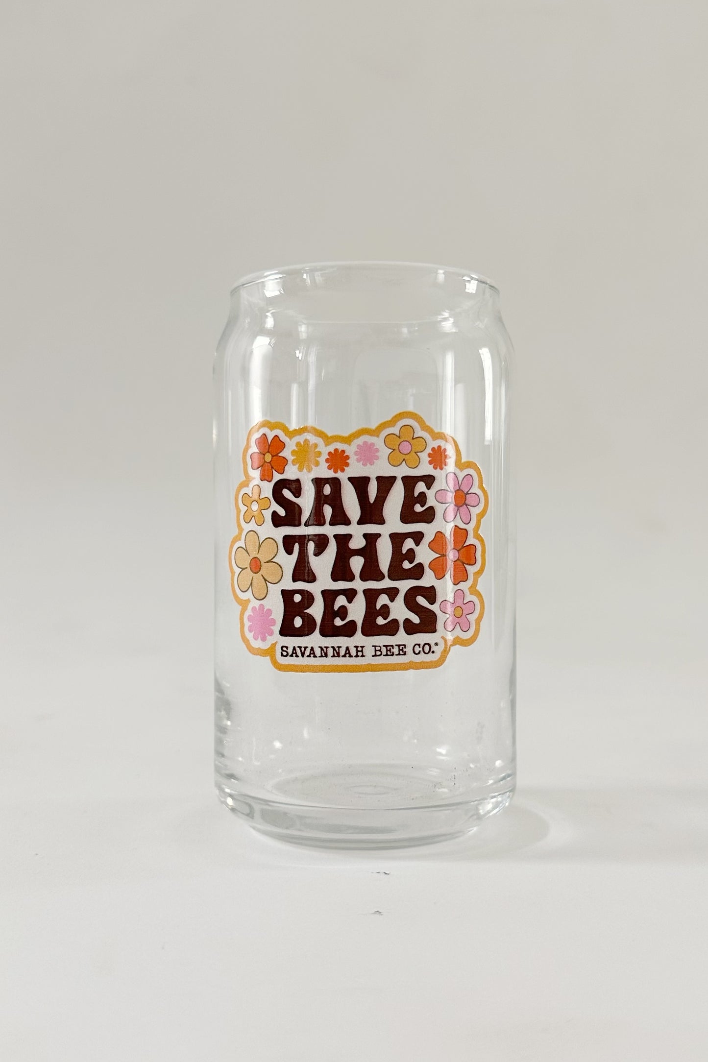Save the bees glass can on white background