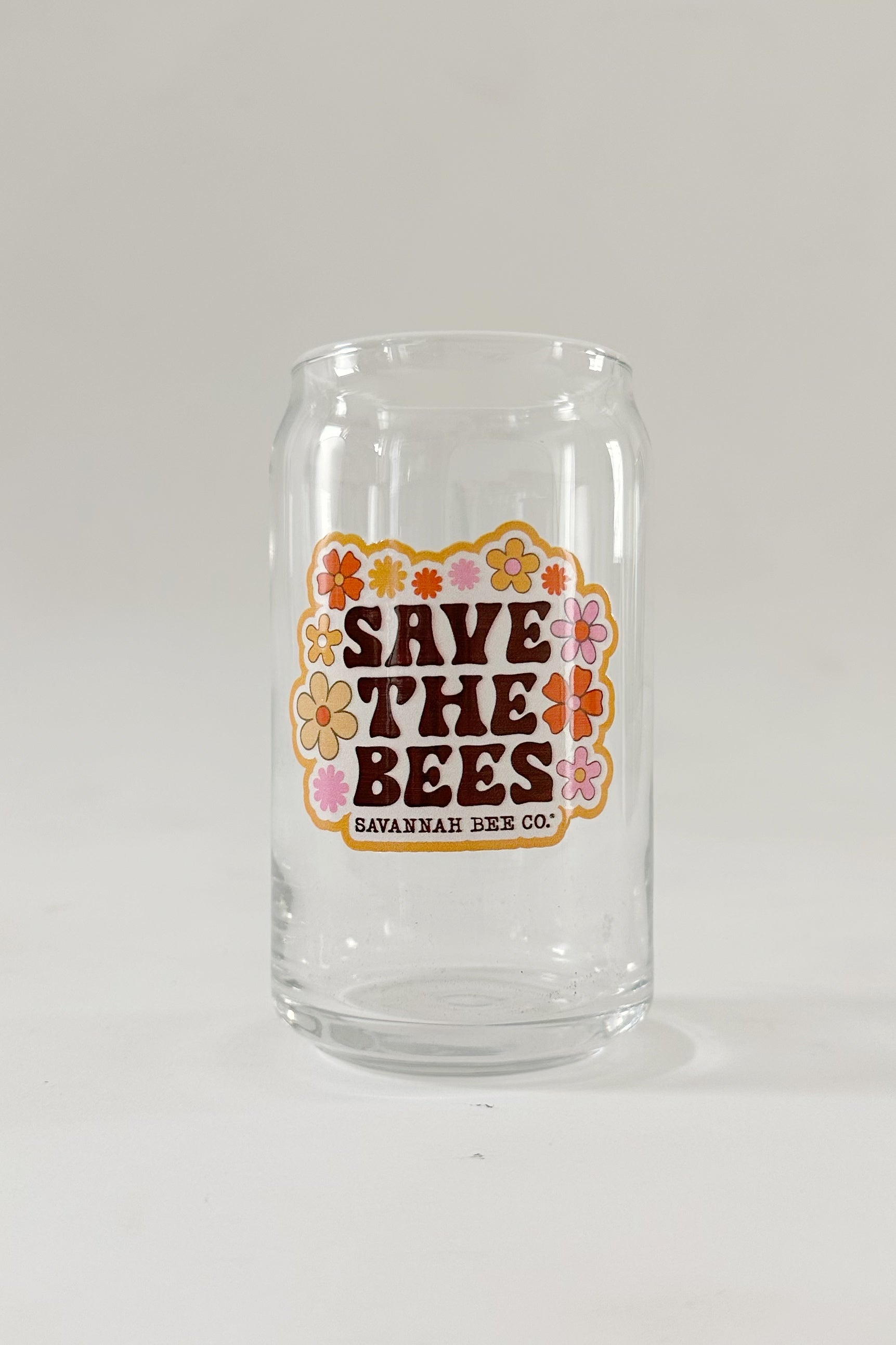 Save the bees glass can on white background