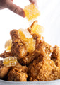 Fried chicken plate with chunks of honeycomb.