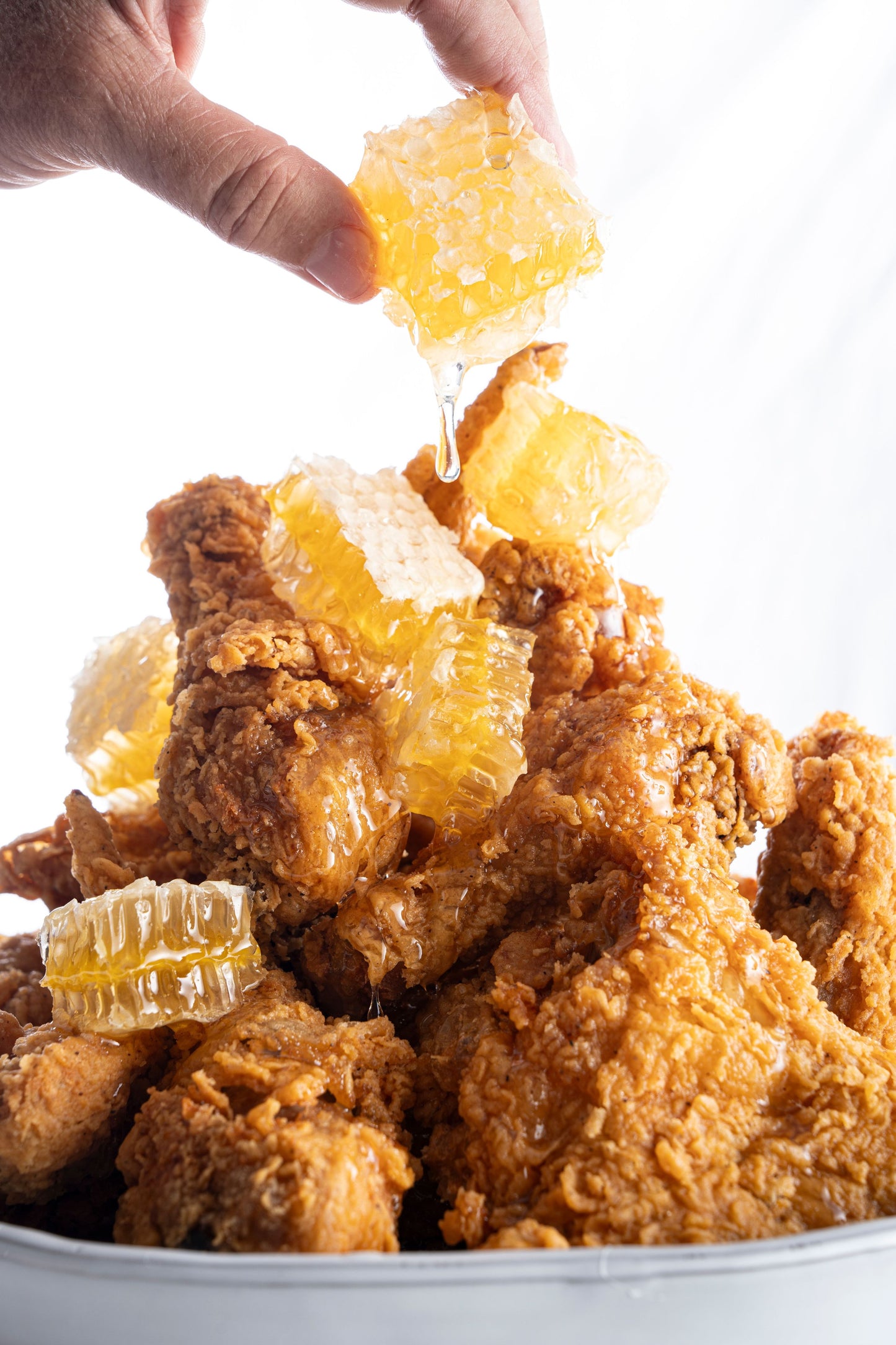 Fried chicken plate with chunks of honeycomb.
