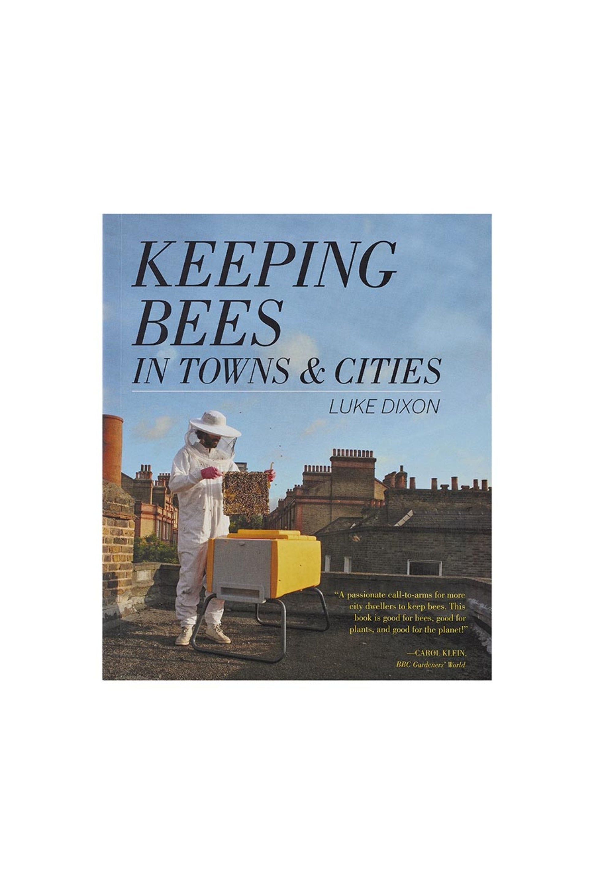 Book: Keeping Bees in Towns & Cities with a beekeeper on a roof in a city on the cover..