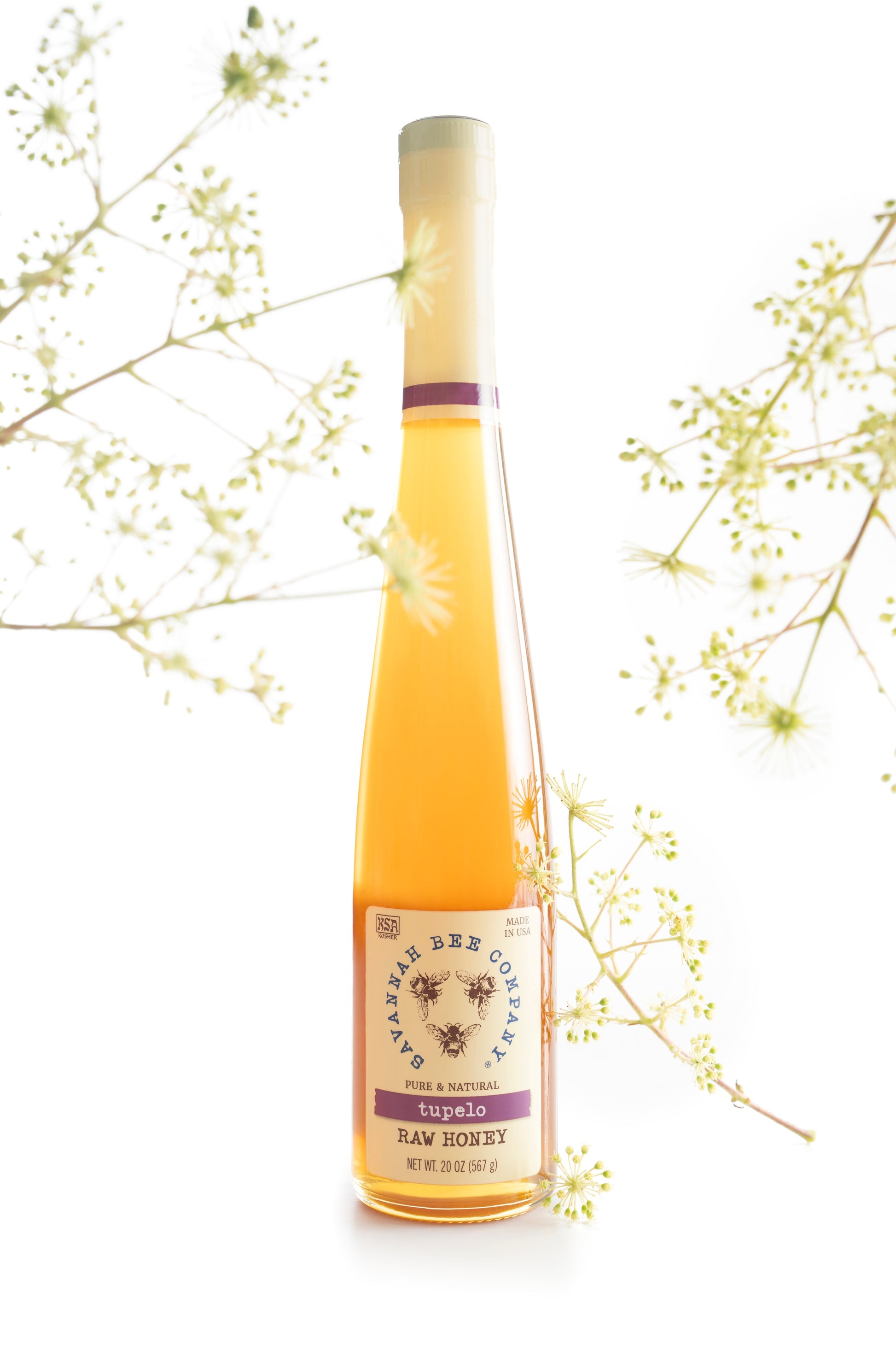 20 ounce Tupelo flute on a white background with tupelo blossoms.