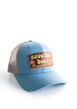 Blue save the bees trucker hat with groovy font facing right