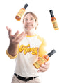 Ted Dennard, owner and head beekeeper at Savannah Bee Juggling honey hot sauce in our new honey raglan t-shirts. 