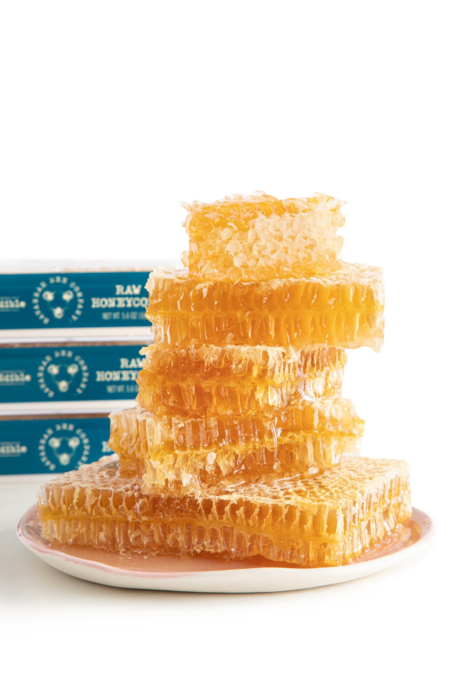 Raw Honeycomb Stacked on a plate.