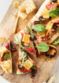 Grilled Fruit Flatbread Pizza with Raw Honeycomb.