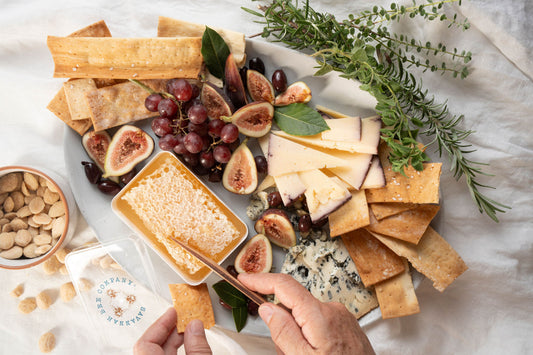 Fruit platter with honeycomb.