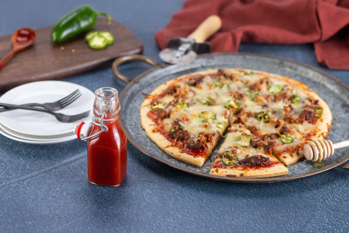 Honey barbeque sauce and pizza.