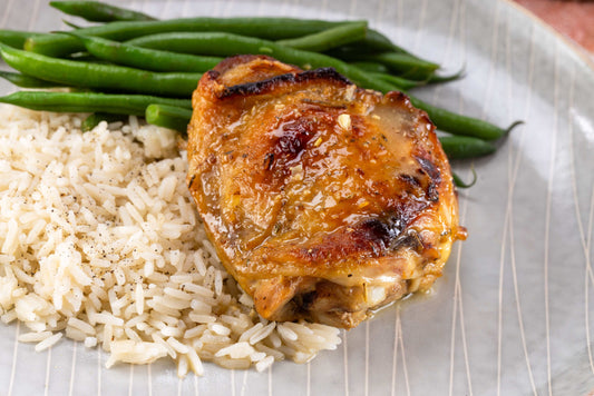 Glazed Honey Mustard Chicken Thighs with green beans and rice.