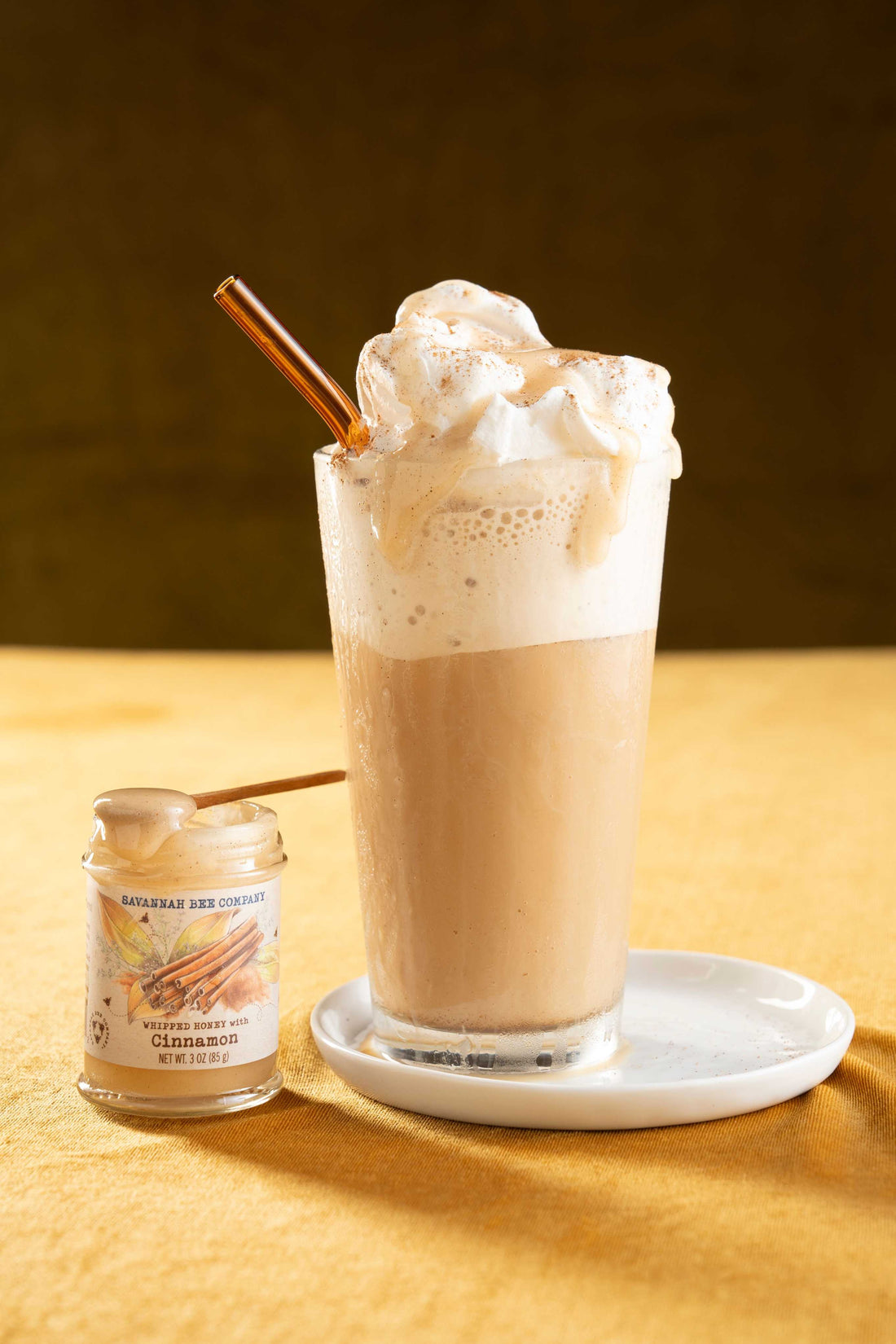 Frozen Snickerdoodle latte with whipped cream and whipped honey with cinnamon.