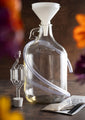 Flower background, Savannah Bee Company Mead Making Kit includes a 1 gallon glass carboy, airlock and rubber stopper, syphon tube, thermometer tape, yeast, yeast nutrients, funnel and step-by-step instructions.