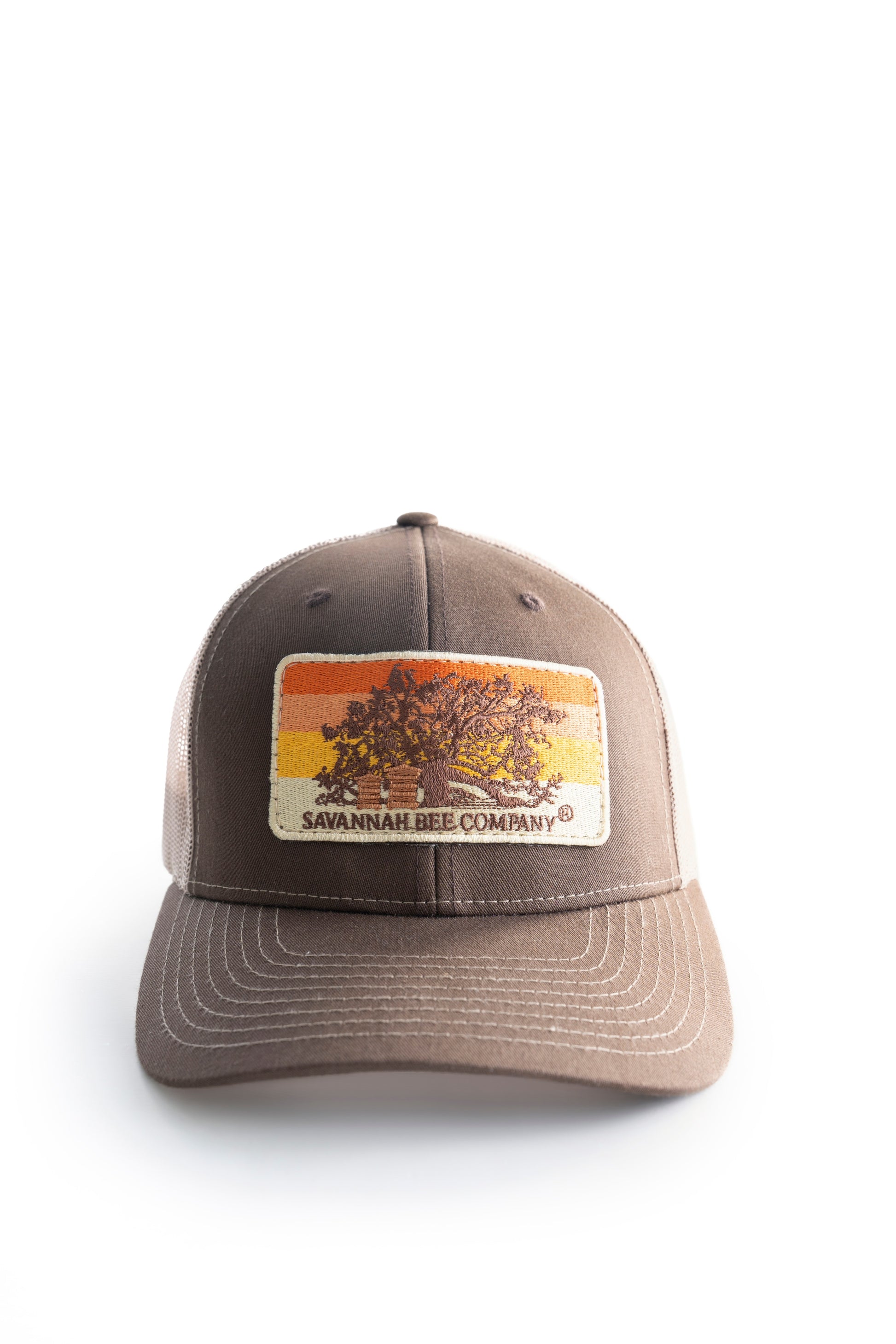 brown trucker hat with oak tree and bee boxes facing front