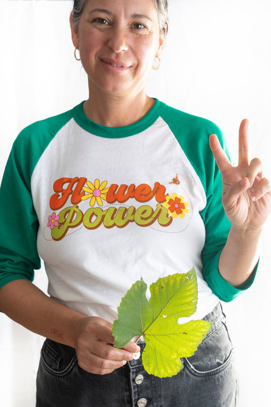 Flower power raglan tee shirt with green sleeves