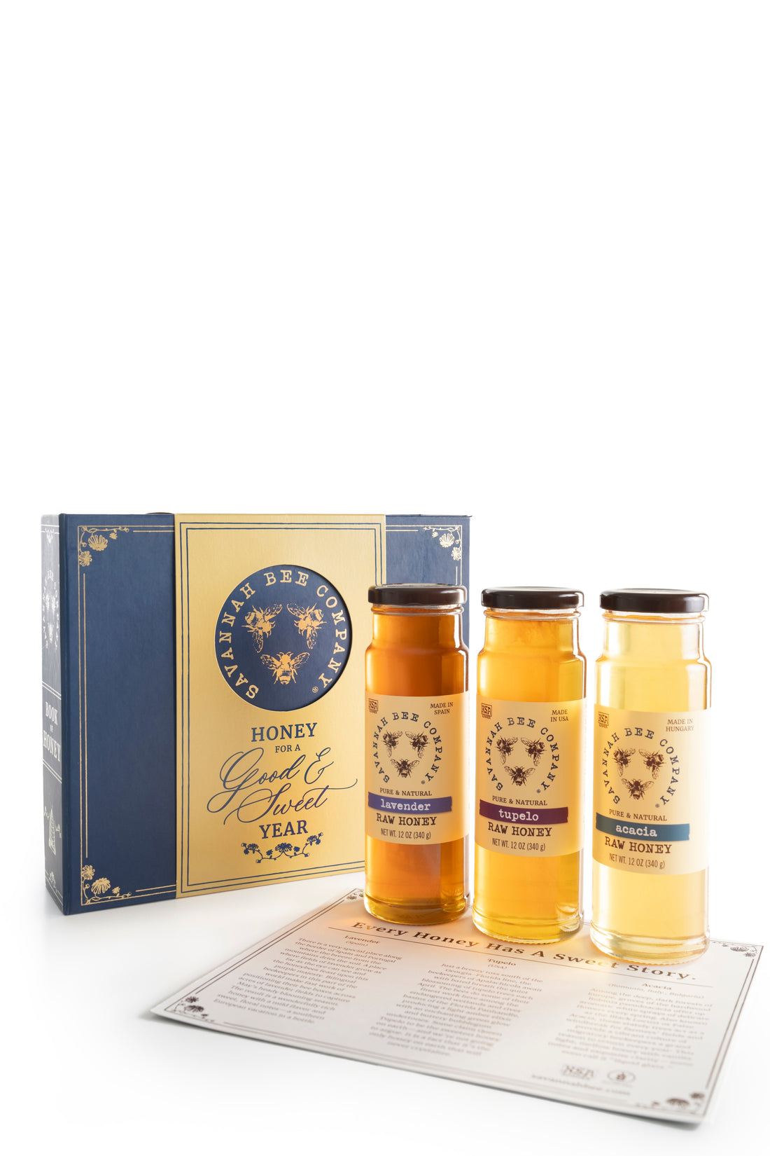Lavender, Tupleo and Acacia 12oz Honey make for the perfect gift. In a navy gift box with gold detailing. A yellow vertical band wraping around the gift that says Honey for a Good and Sweet Year.