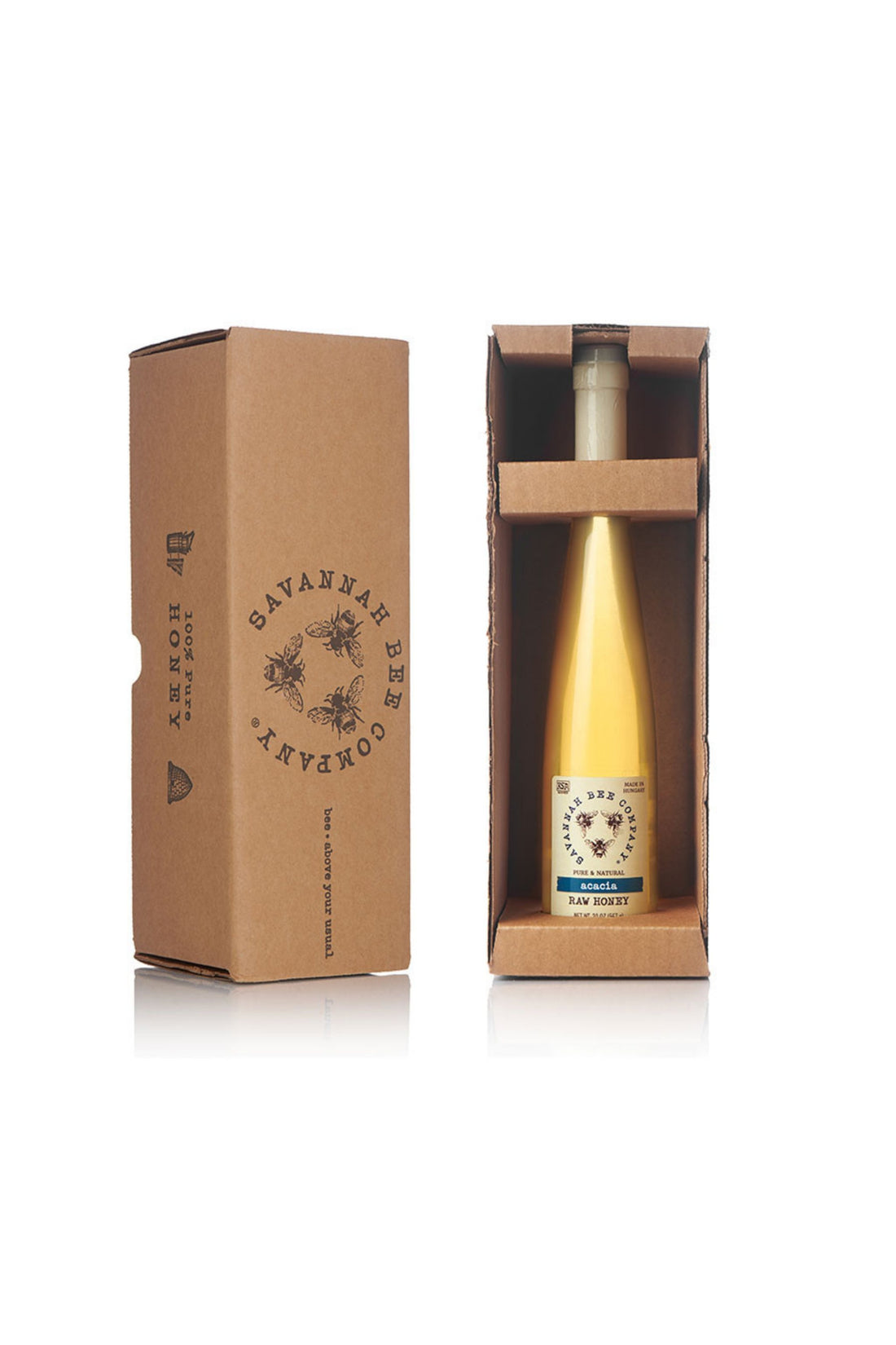 Pure & Natural Acacia Raw Honey 20 oz. flute in a gift box with Savannah Bee Company logo studio image.