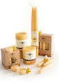 100% Pure Organic Beeswax Candles come in sizes 3 x 3.5 Pillars, 3x6 Pillar, Tea Light Pack 16 and 12' Taper Candles studio image