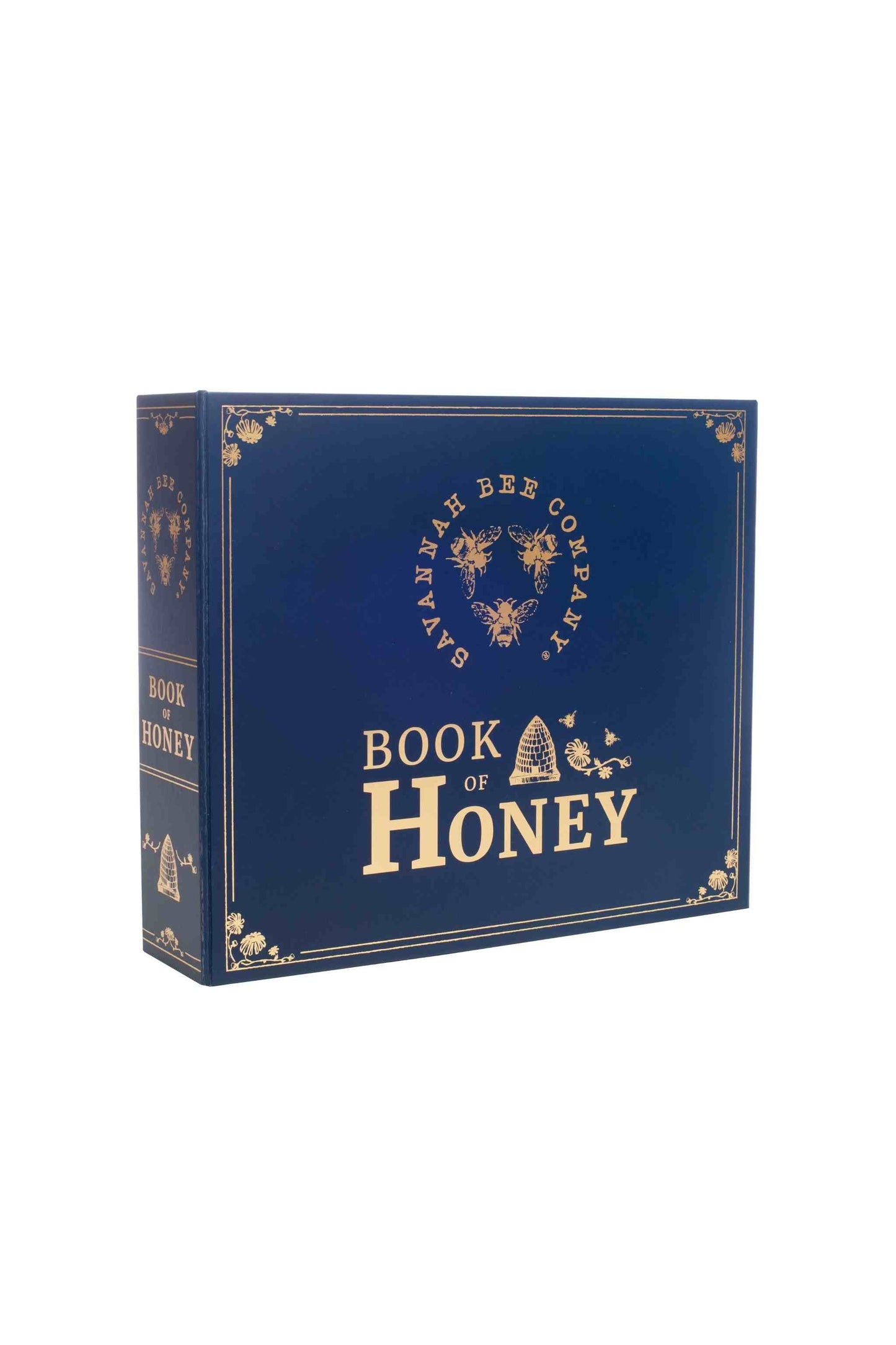 Savannah Bee Company Book Of Honey. The book is navy with gold detailing. 