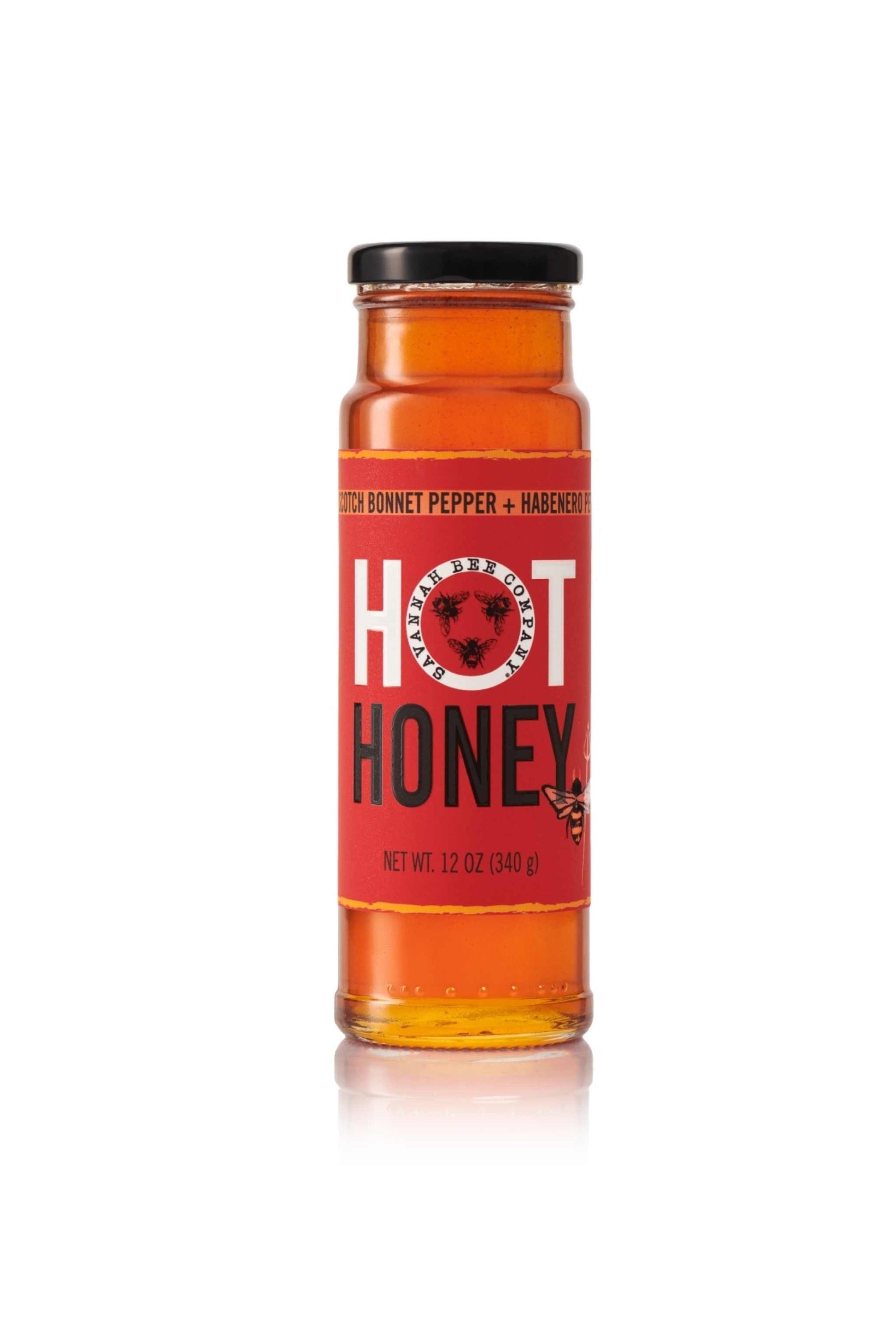 12 ounce hot honey jar on white background