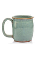 Handcrafted stoneware mug in light blue color back facing