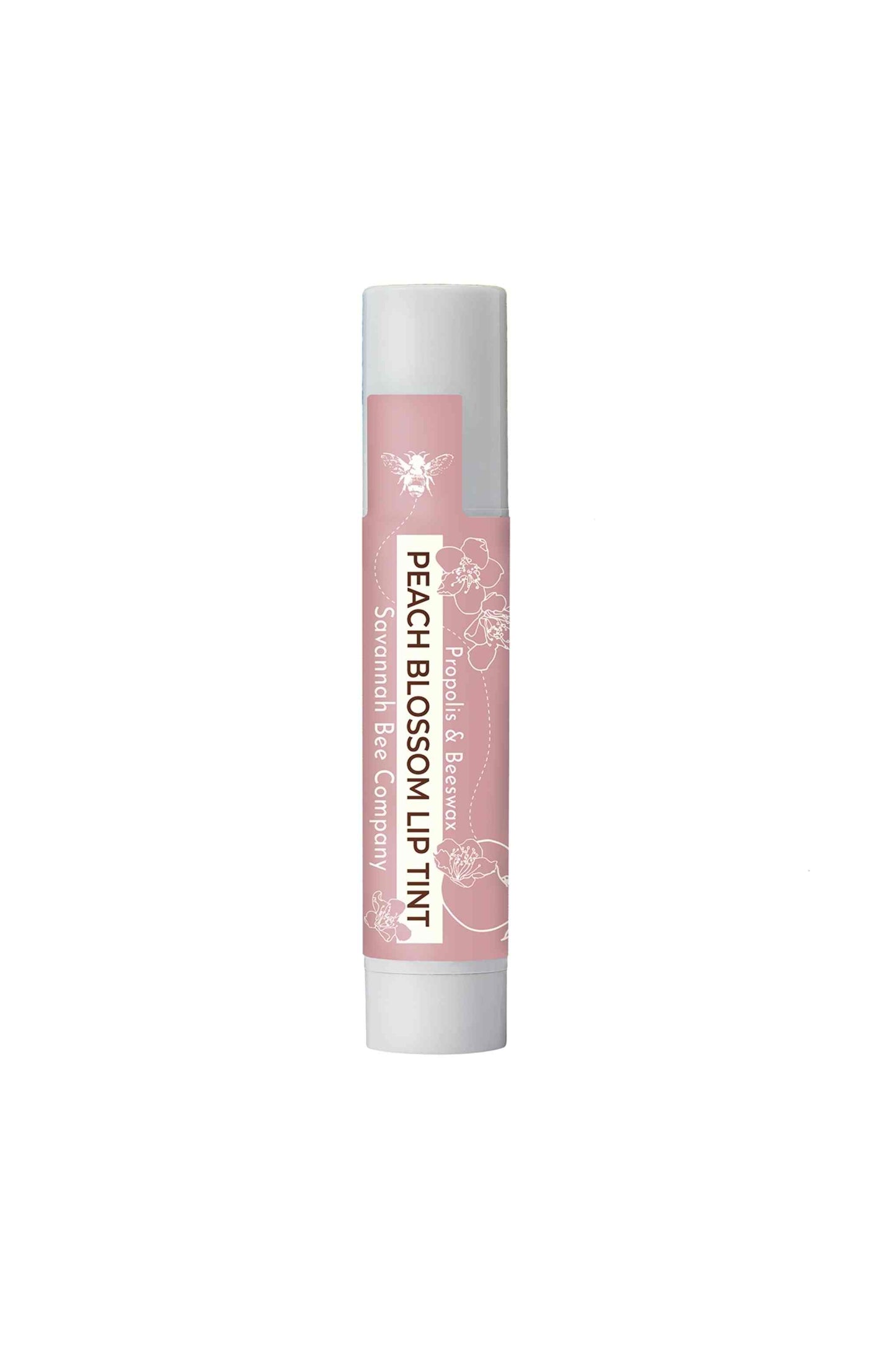 Savannah Bee Company Beeswax Peach Blossom Lip Tint peach and white lipstick tube.
