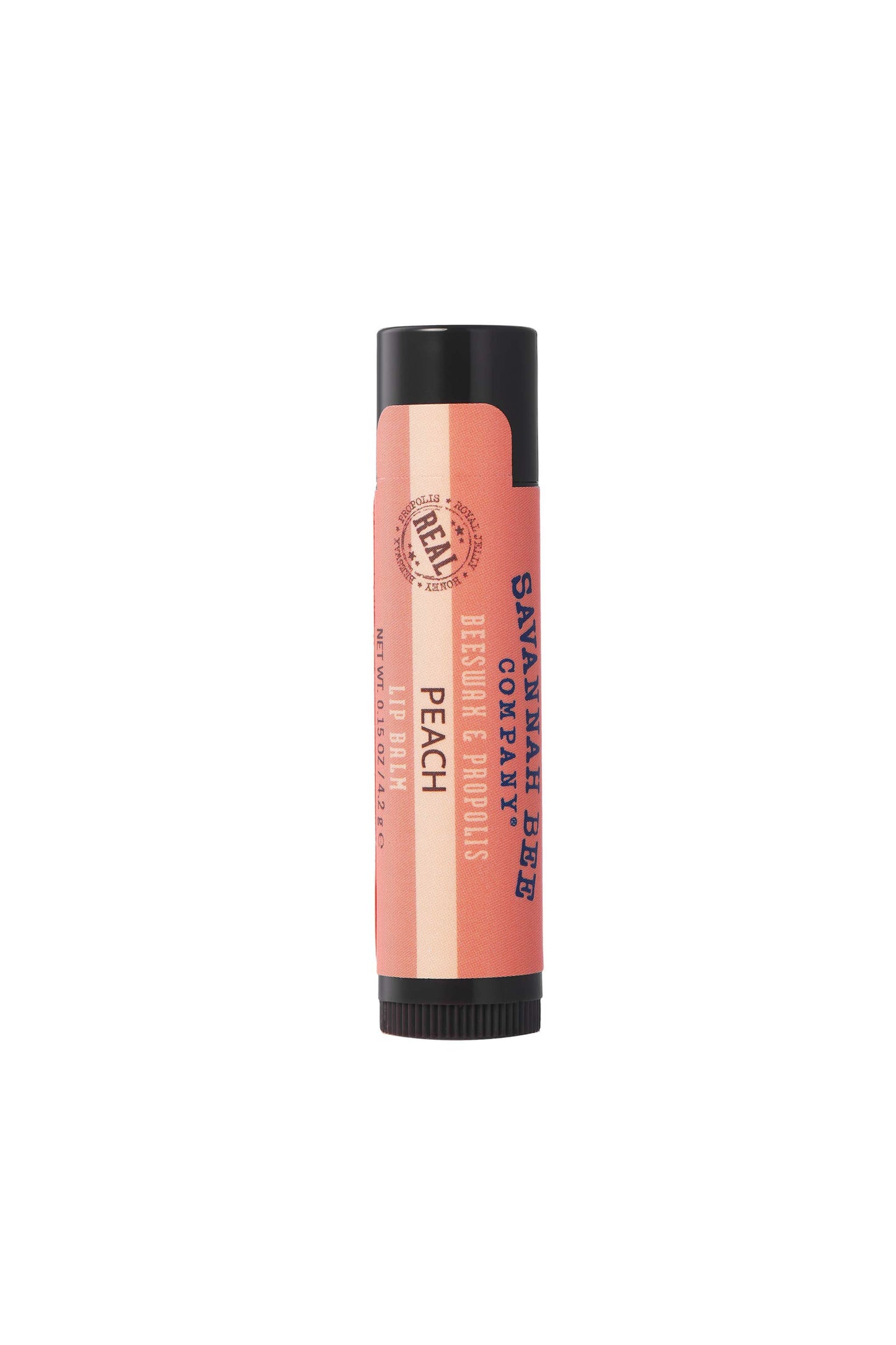 Savannah Bee Company Peach Beeswax & Propolis Lip Balm peach colored lipstick tube.