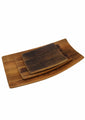 Three sizes of wine barrel platters grouped together side view
